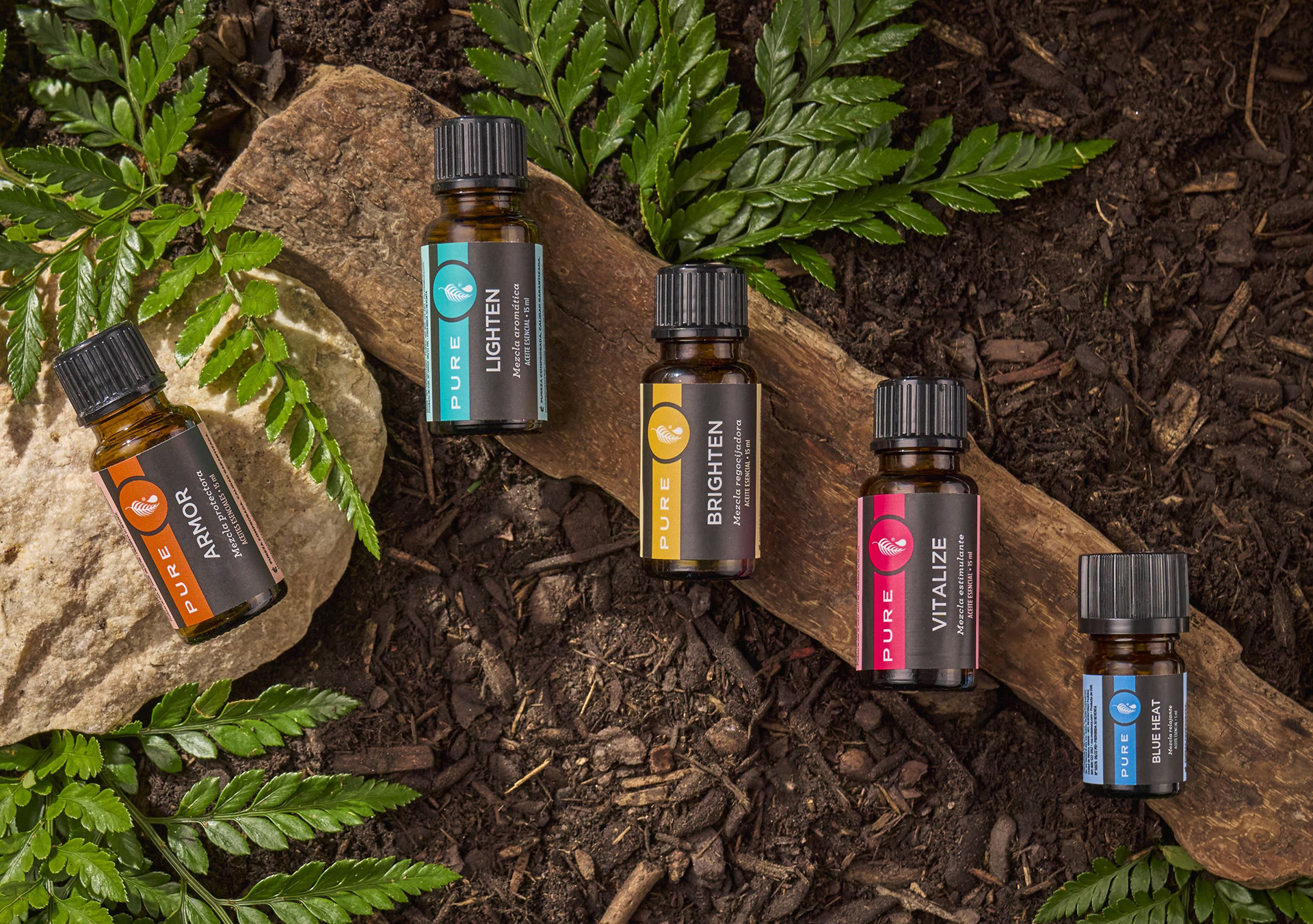 Four bottles of Melaleuca’s Pure ready-to-use essential oil blends.