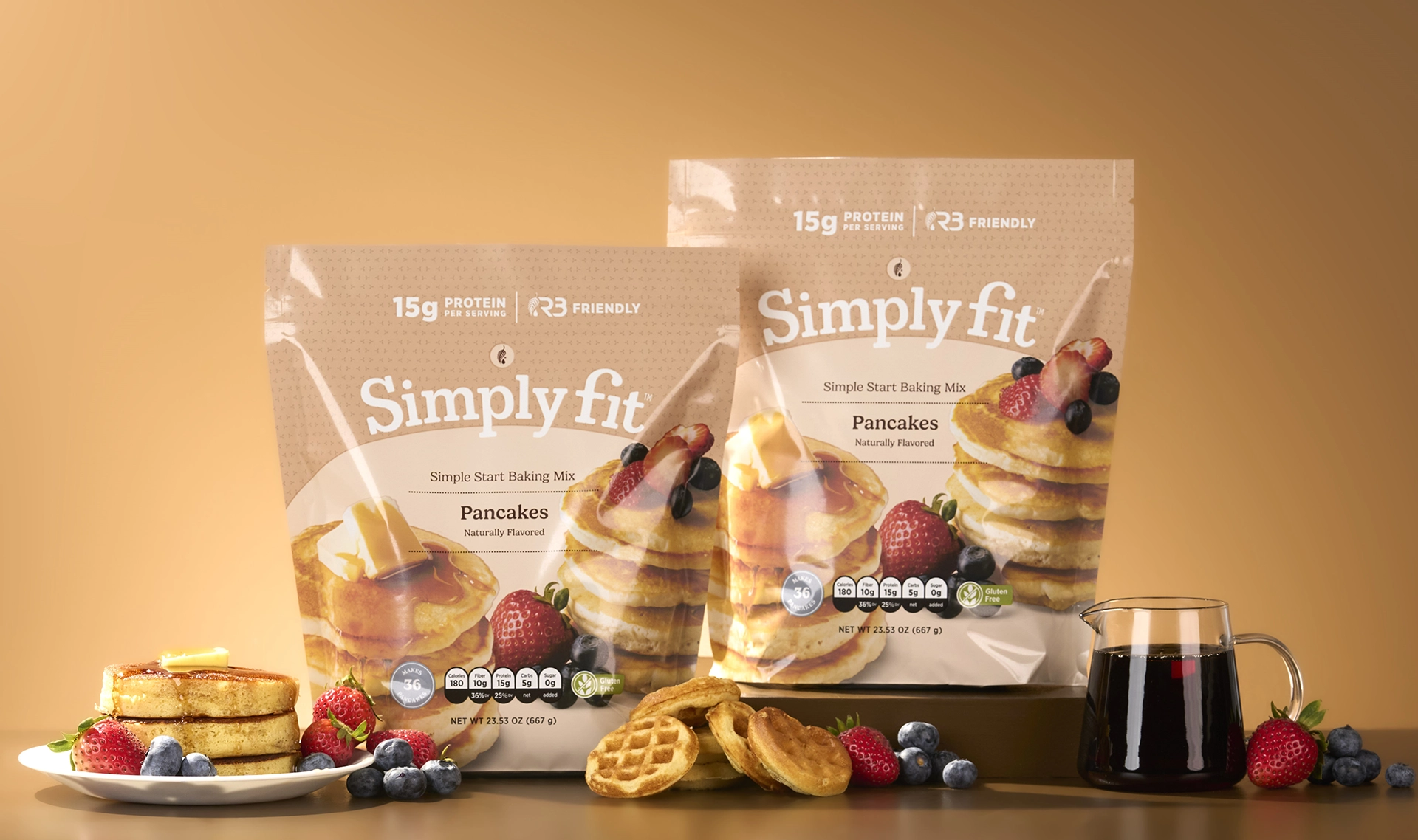 Melaleuca Simply Fit pancake mixes next to waffles and syrup.